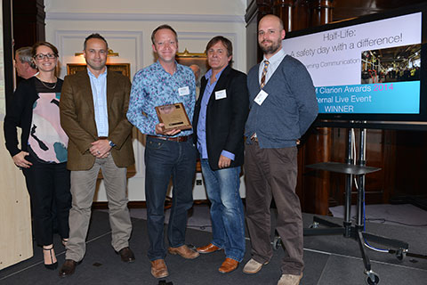 The Juice Learning Team accepting their award at the EVCOM Clarion Awards ceremony